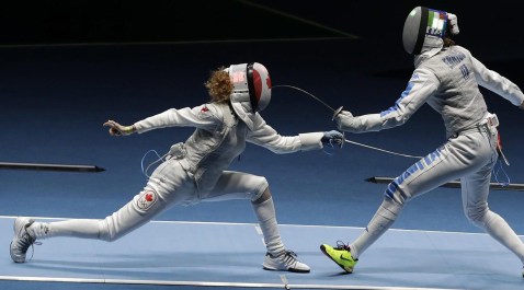 Eleanor Harvey of Canada, left, and Arianna Errigo of Italy compete in a women's individual foil event at the 2016 Summer Olympics in Rio de Janeiro, Brazil, Wednesday, Aug. 10, 2016. (AP Photo/Andrew Medichini)