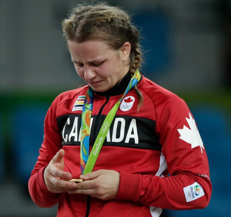EricaWiebe_75kg_gold_DavidJacksonPhoto-9-7 Erica Wiebe looks at her 75kg wrestling gold medal at the 2016 Olympic Games in Rio (Photo: COC/David Jackson)