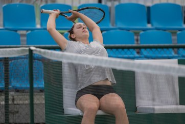 Canadian tennis player Gabriela Dabrowski stretches during a break in a training session prior to the start of the Olympic Games in Rio de Janeiro, Brazil, Wednesday, August 3, 2016. COC Photo by Jason Ransom