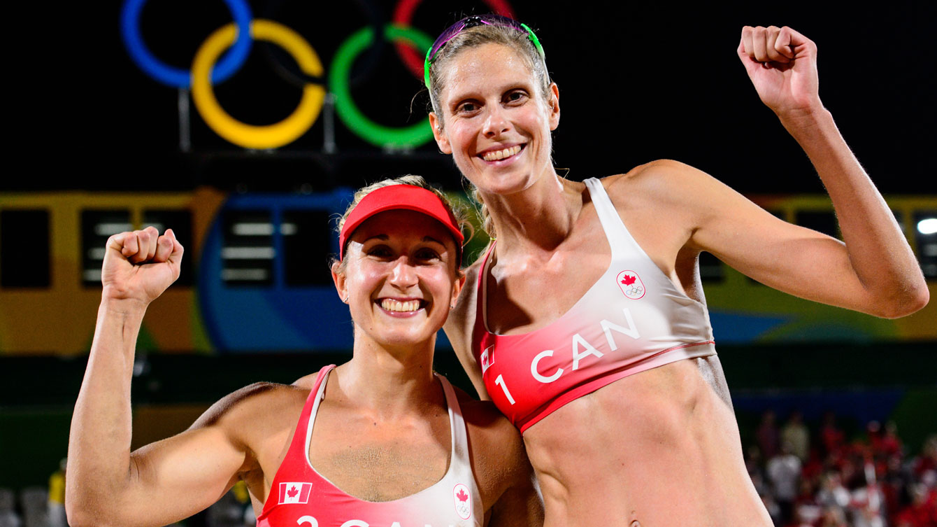 Sarah Pavan and Heather Bansley celebrate a victory over Switzerland at Rio 2016 / Photo via FIVB