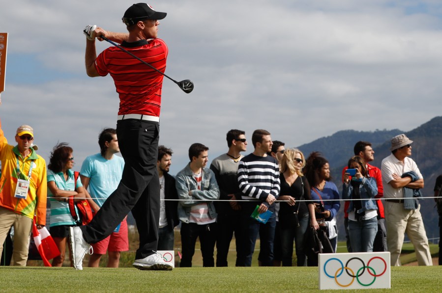 Canadian Graham DeLaet tees off at the first round of the Rio 2016 golf event on August 11, 2016. COC Photo/Mark Blinch