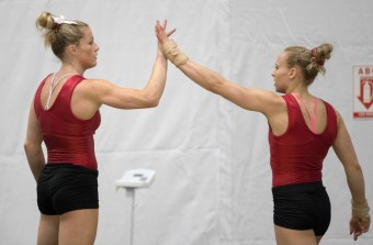 Gymnastics_Training_JasonRansomPhoto-68 Brittany Rogers, left, high-fives Ellie Black during a training session at the Olympic games in Rio de Janeiro, Brazil, Sunday, July 31, 2016. COC Photo by Jason Ransom