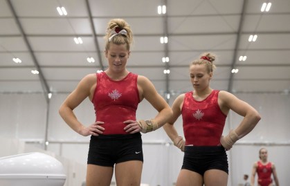 Brittany Rogers and Ellie Black chat during a training session at the Olympic games in Rio de Janeiro, Brazil, Sunday, July 31, 2016. COC Photo by Jason Ransom