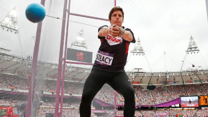 Heather Steacy competes in a women's hammer throw qualification round during the athletics in the Olympic Stadium at London 2012. (AP Photo/Matt Dunham)