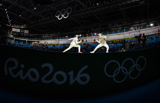 Canada's Maximilien van Haaster, right, competes against against Venezuela's Antonio Leal in their Men's Foil Individual Table of 64 fencing match at the Olympic games in Rio de Janeiro, Brazil, Sunday August 7, 2016. COC Photo/Mark Blinch