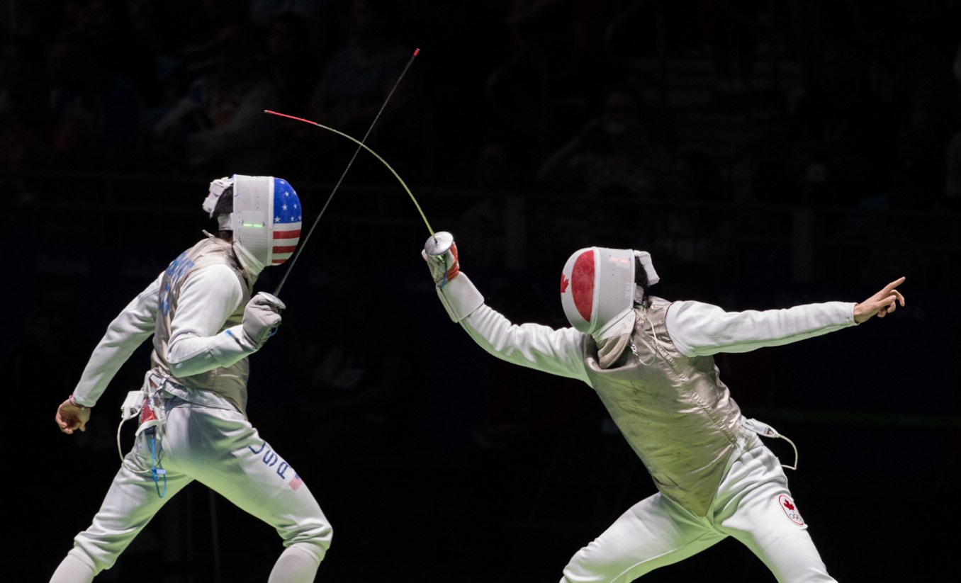 Canada's Maximilien van Haaster, right, competes against against USA's Gerek Meinhardt in their Men's Foil Individual Table of 32 fencing match at the Olympic games in Rio de Janeiro, Brazil, Sunday August 7, 2016. COC Photo/Mark Blinch