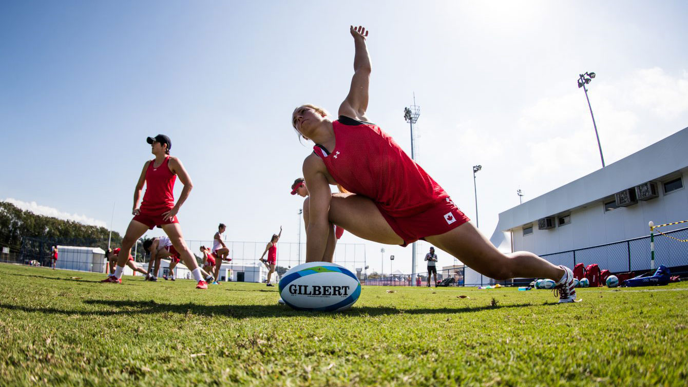 Megan Lukan stretches during team Canada women's rugby practice ahead of the Olympic games in Rio de Janeiro, Brazil, Tuesday August 2, 2016. COC Photo/Mark Blinch