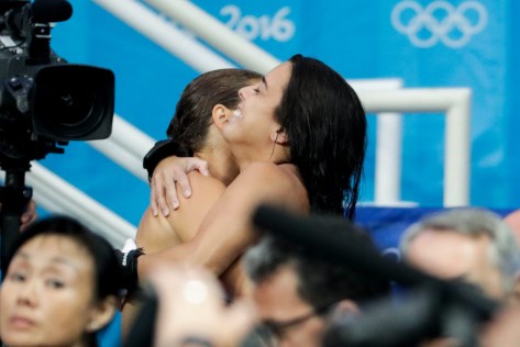 Meaghan Benfeito and Roseline Filion embrace after Filions final career dive. August 18, 2016 (photo Jason Ransom