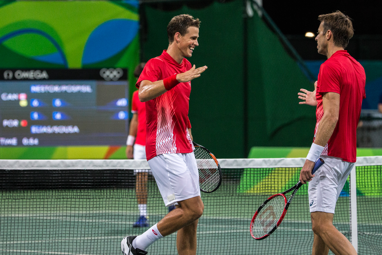Team Canada's Daniel Nestor and Vasek Pospisil compete against Portugal in the men's second round of doubles tennis, Rio de Janeiro, Brazil, Monday August 8, 2016. COC Photo/David Jackson