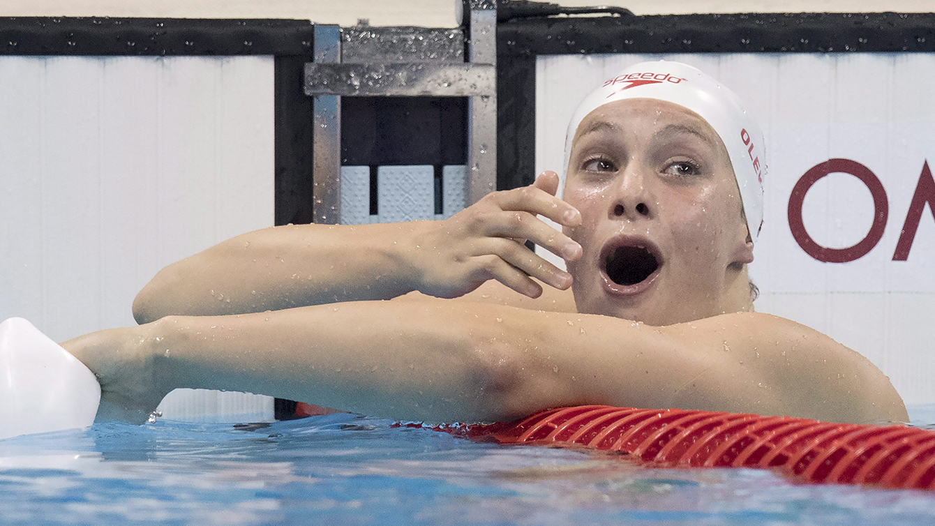 Penny Oleksiak reacts after seeing she won silver in 100m butterfly at Rio 2016 on August 7, 2016.