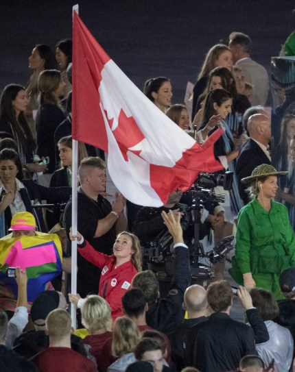 Rosie Mecllenan leads team Canada in to the stadium during the opening ceremonies at the Olympic games in Rio de Janeiro, Brazil, Friday, August 5, 2016. COC/Jason Ransom