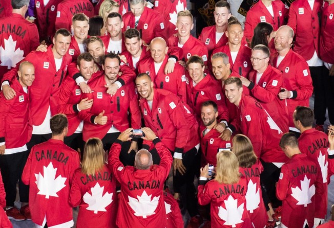 Team Canada takes pictures as they arrive during the opening ceremony for the Olympic games at Maracana Stadium in Rio de Janeiro, Brazil, Friday August 5, 2016. COC/Mark Blinch