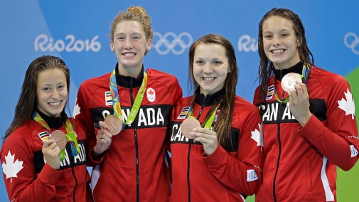 Rio Olympics Swimming Canada's Katerine Savard, Taylor Ruck, Brittany Maclean and Penny Oleksiak, from left, hold up their bronze medals during the women's 4 x 200-meter freestyle relay medals ceremony during the swimming competitions at the 2016 Summer Olympics, Thursday, Aug. 11, 2016, in Rio de Janeiro, Brazil.