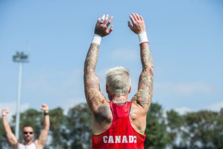 Team Canada's Jen Kish stretches during the women's rugby team practice ahead of the Olympic games in Rio de Janeiro, Brazil, Tuesday August 2, 2016. COC Photo/David Jackson