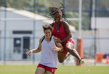 Team Canada's Charity Williams jumps on Britt Benn during women's rugby practice ahead of the Olympic games in Rio de Janeiro, Brazil, Tuesday August 2, 2016. COC Photo/Mark Blinch