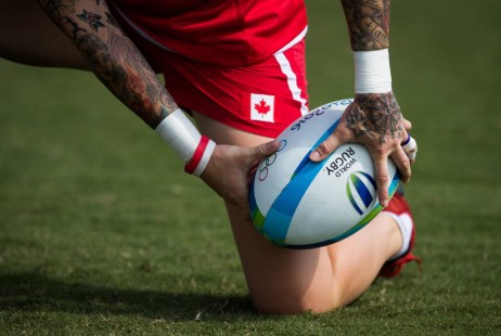 Team Canada's Jen Kish holds a rugby ball during women's rugby practice ahead of the Olympic games in Rio de Janeiro, Brazil, Tuesday August 2, 2016. COC Photo/Mark Blinch