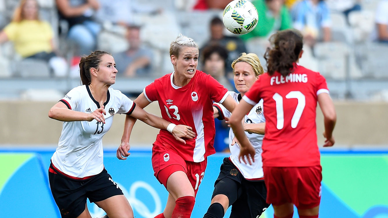 Sophie Schmidt (13) of Canada battles for a ball against Germany in the Olympic football semifinals on August 16, 2016.
