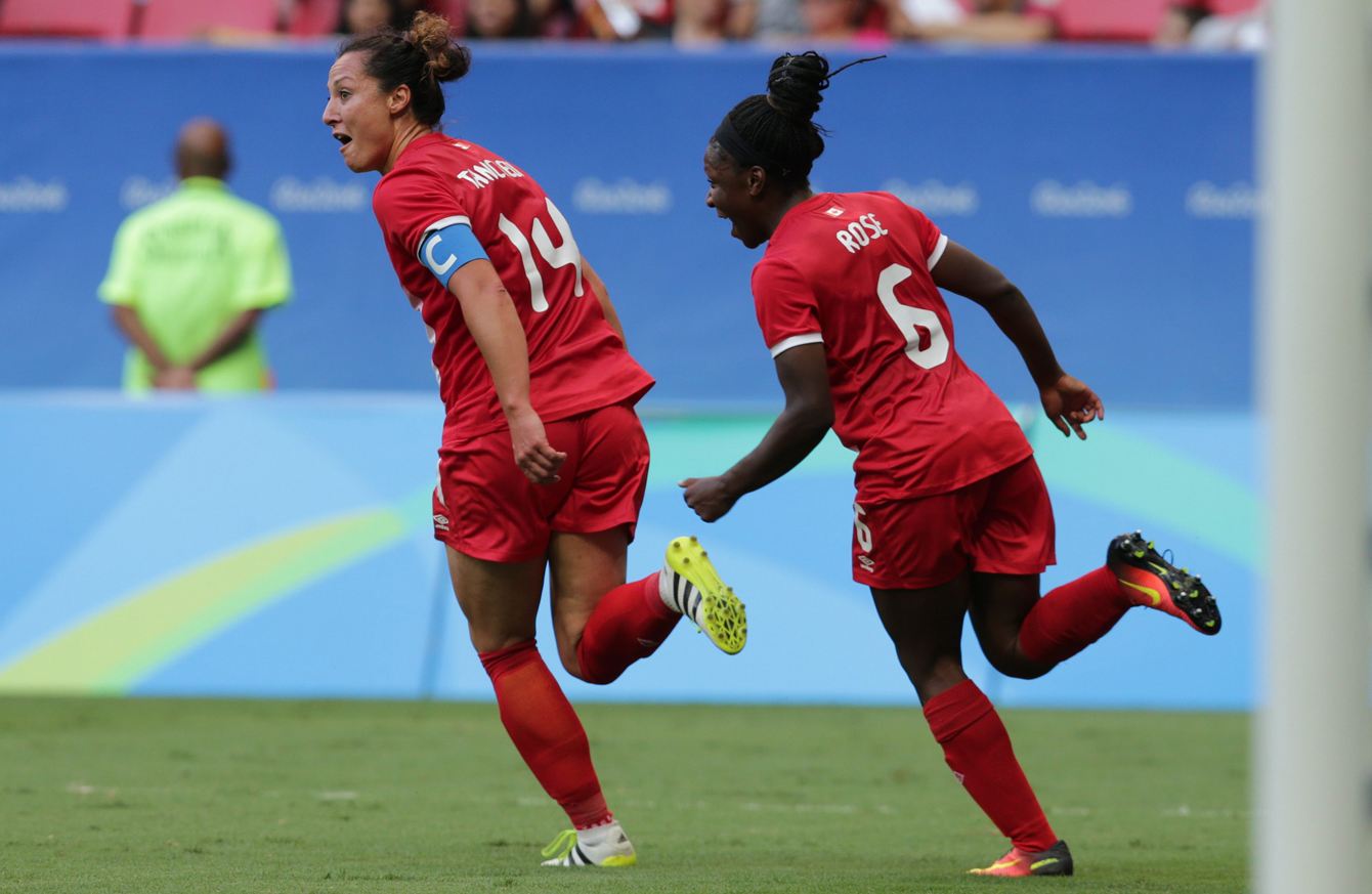 Canada's Melissa Tancredi celebrates after scoring during a Group F match of the women's Olympic football tournament between Germany and Canada at the National Stadium, in Brasilia, Brazil, Tuesday, Aug. 9, 2016. (AP Photo/Eraldo Peres)