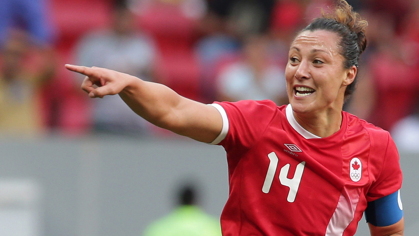 Canada's Melissa Tancredi celebrates after scoring during a Group F match of the women's Olympic football tournament between Germany and Canada at the National Stadium, in Brasilia, Brazil, Tuesday, Aug. 9, 2016. (AP Photo/Eraldo Peres)