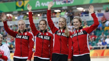 Canada's women's team pursuit team Allison Beveridge, Jasmin Glaesser, Kirsti Lay, and Georgia Simmerling await their bronze medals at the velodrome at the Olympic games in Rio de Janeiro, Brazil, Saturday August 13, 2016. (photo/ Mark Blinch)