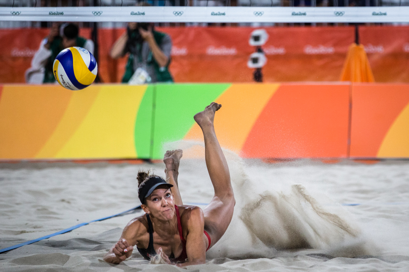 Team Canada's women's beach volleyball duo, Kristina Valises and Jamie Broder, battle in a preliminary match against Italy, Copacabana Beach, Rio de Janeiro, Brazil, Sunday August 7, 2016. COC Photo/David Jackson