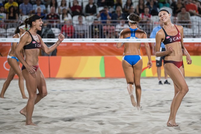 Team Canada's women's beach volleyball duo, Kristina Valjas and Jamie Broder, battle in a preliminary match against Italy, Copacabana Beach, Rio de Janeiro, Brazil, Sunday August 7, 2016. COC Photo/David Jackson