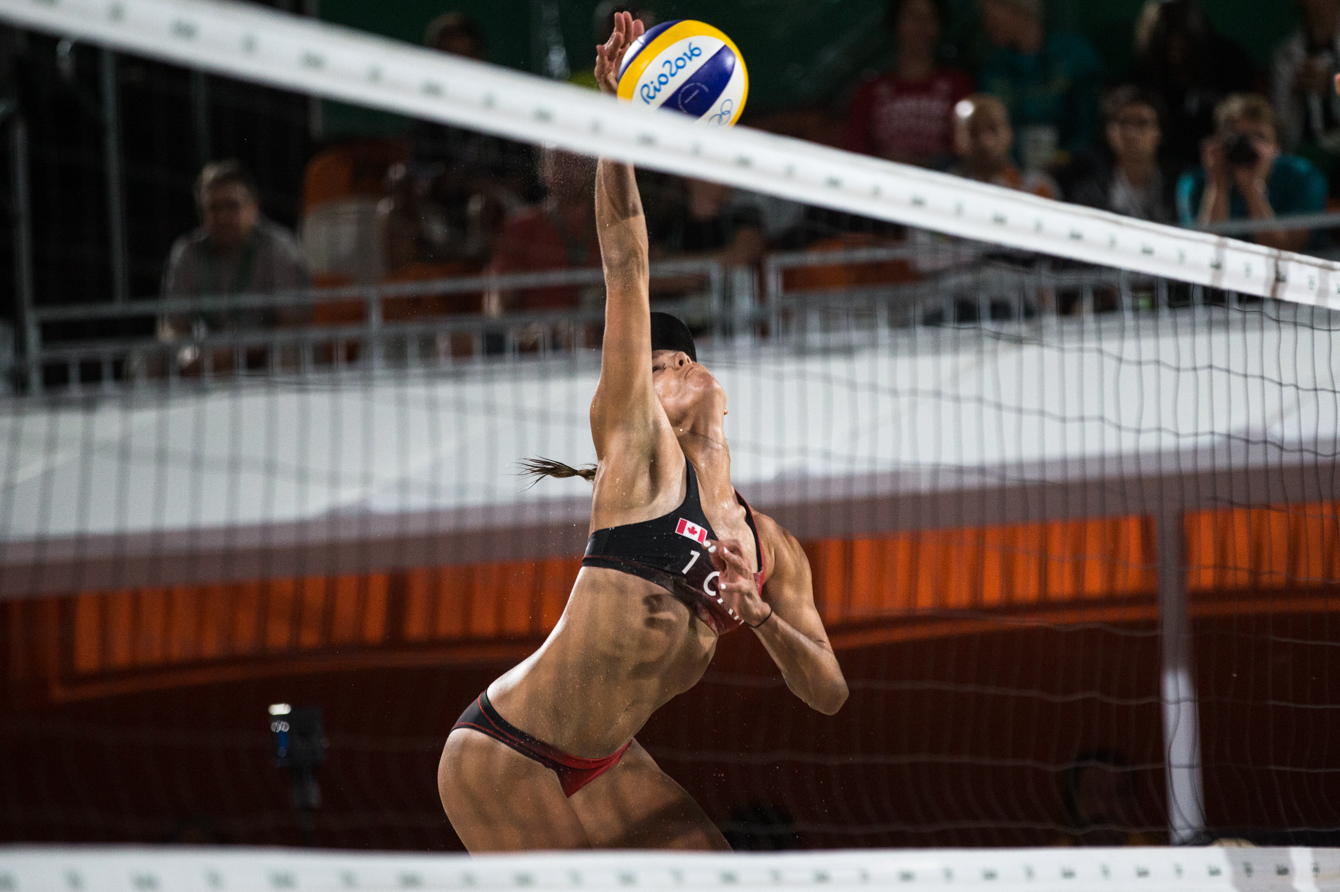 Team Canada's women's beach volleyball duo, Kristina Valjas and Jamie Broder, battle in a preliminary match against Italy, Copacabana Beach, Rio de Janeiro, Brazil, Sunday August 7, 2016. COC Photo/David Jackson