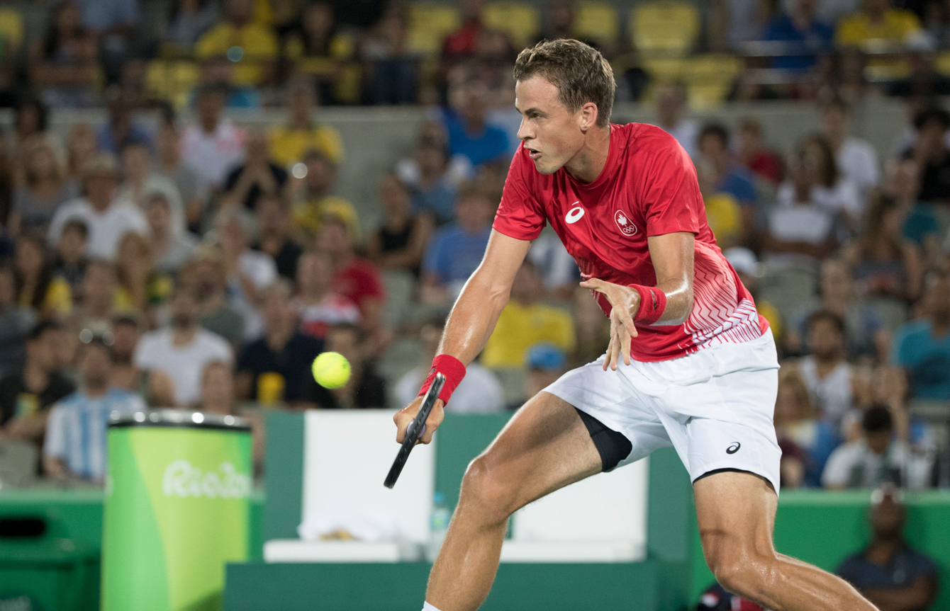 Vasek Pospisil competes against Gael Monfils of France at the Olympic games in Rio de Janeiro, Brazil, Saturday, August 6, 2016. COC Photo by Jason Ransom