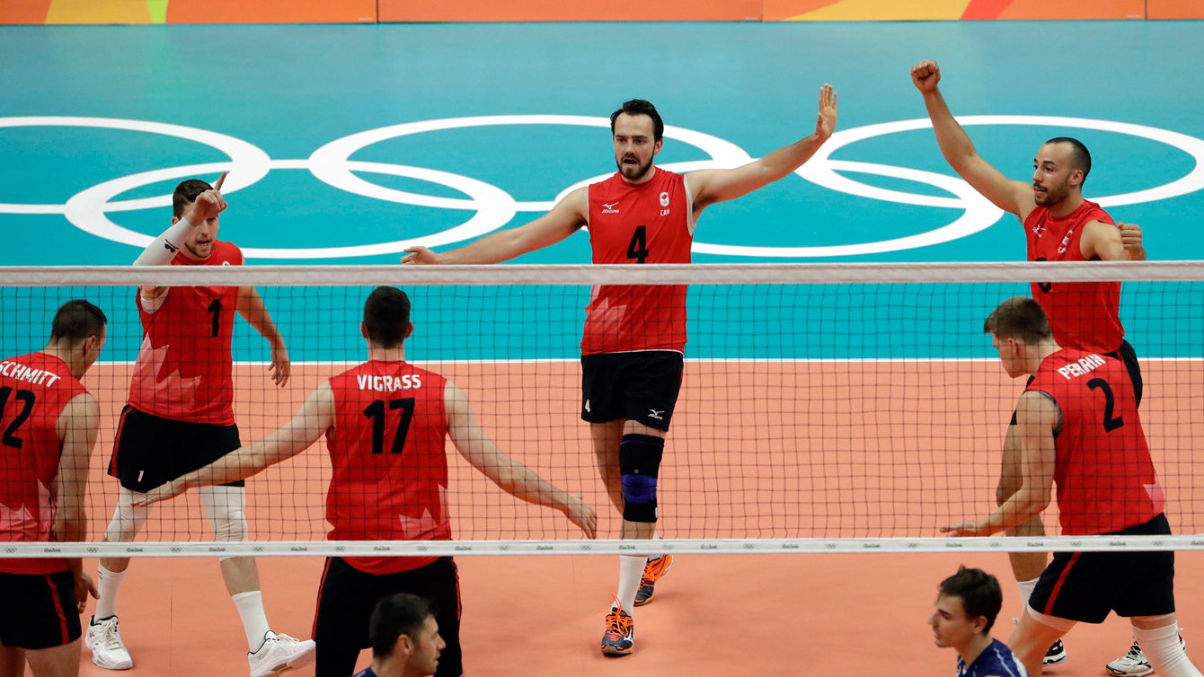 Canada secures spot in Olympic volleyball quarterfinals with win over Italy Team Canada