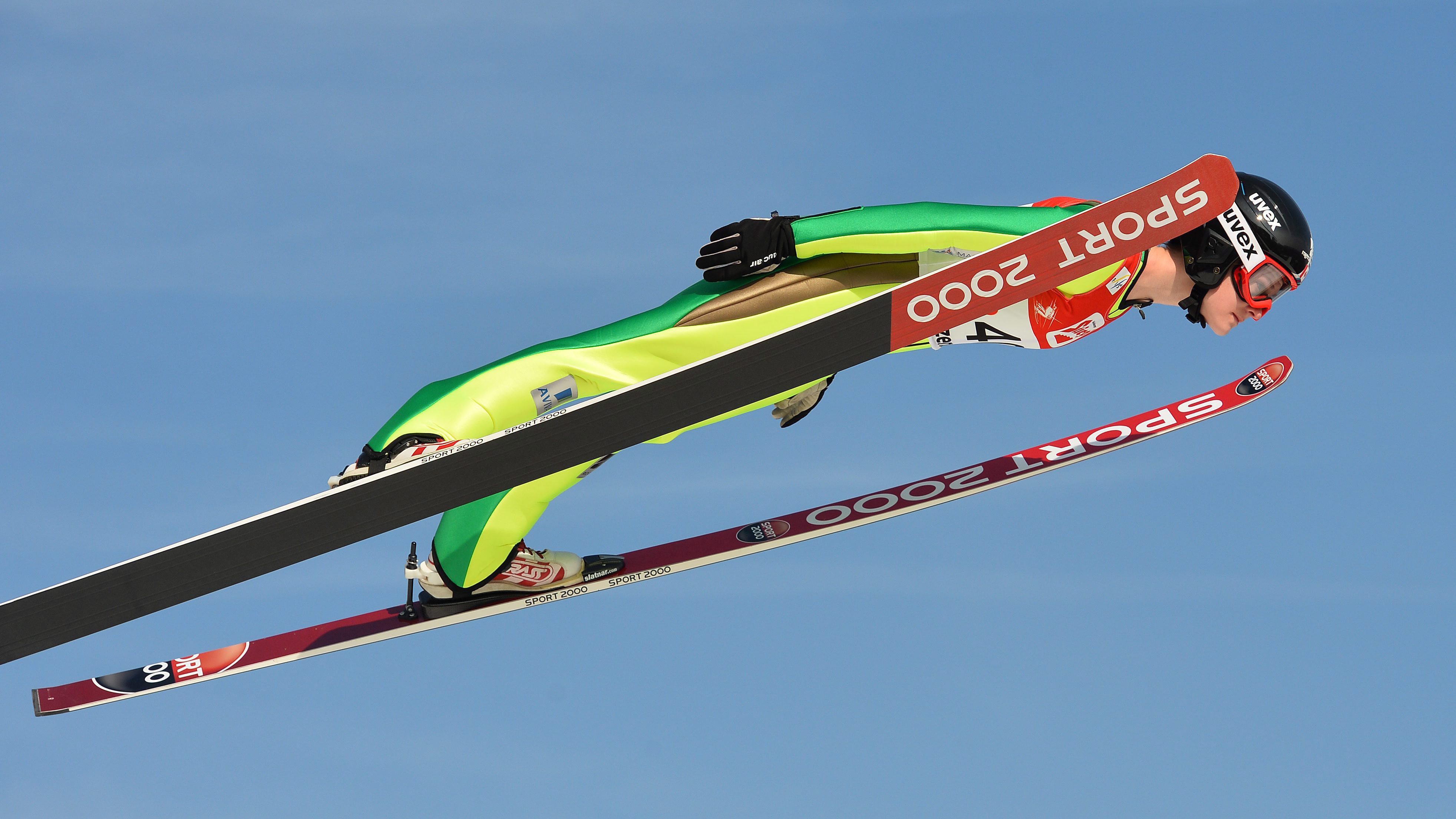 Canada's Taylor Henrich competes during her qualification jump of the Ski Jumping Ladies World Cup in Hinzenbach, Austria, on Sunday, Feb. 7, 2016. (AP Photo/Kerstin Joensson)