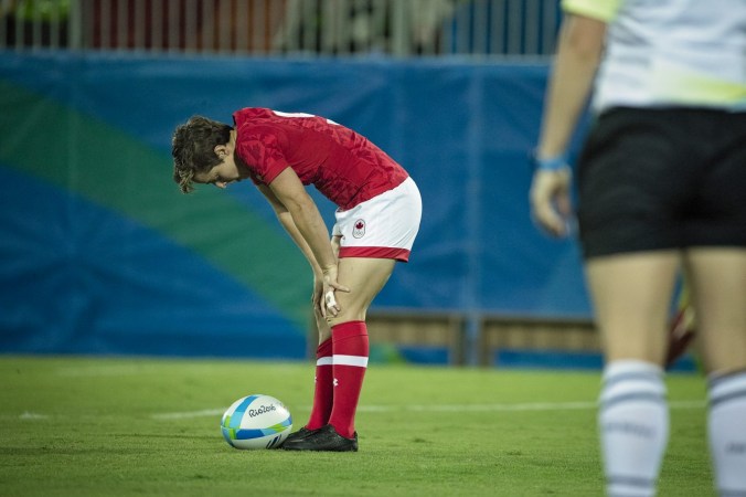 Ghislaine Landry takes a moment to collect herself before kicking off during a match at Rio 2016 (Photo: Paige Stewart).