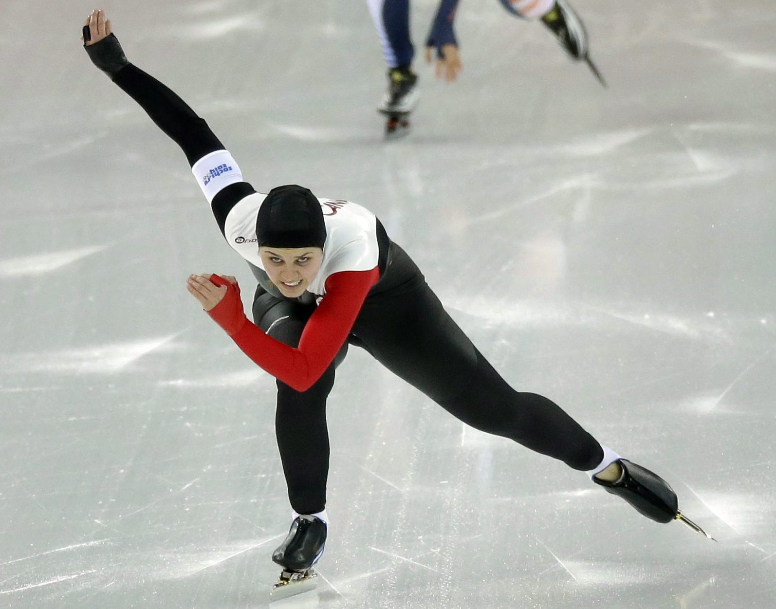Canada's Marsha Hudey competes in the first heat of the women's 500-metre speed skating race at the Adler Arena Skating Center during the 2014 Winter Olympics, Tuesday, Feb. 11, 2014, in Sochi, Russia. (AP Photo/David J. Phillip )