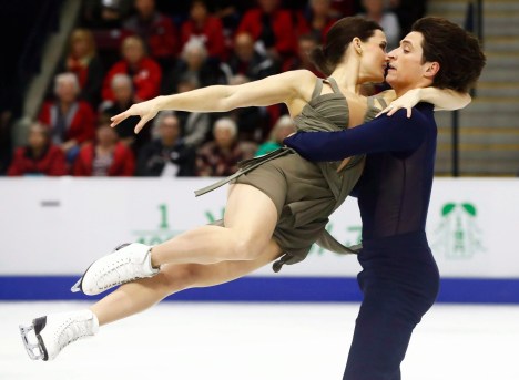 Canada's Tessa Virtue and Scott Moir perform in the Ice Dance Free Skating Program during the 2016 Skate Canada International competition in Mississauga, Ont., on Saturday, October 29, 2016. THE CANADIAN PRESS/Mark Blinch