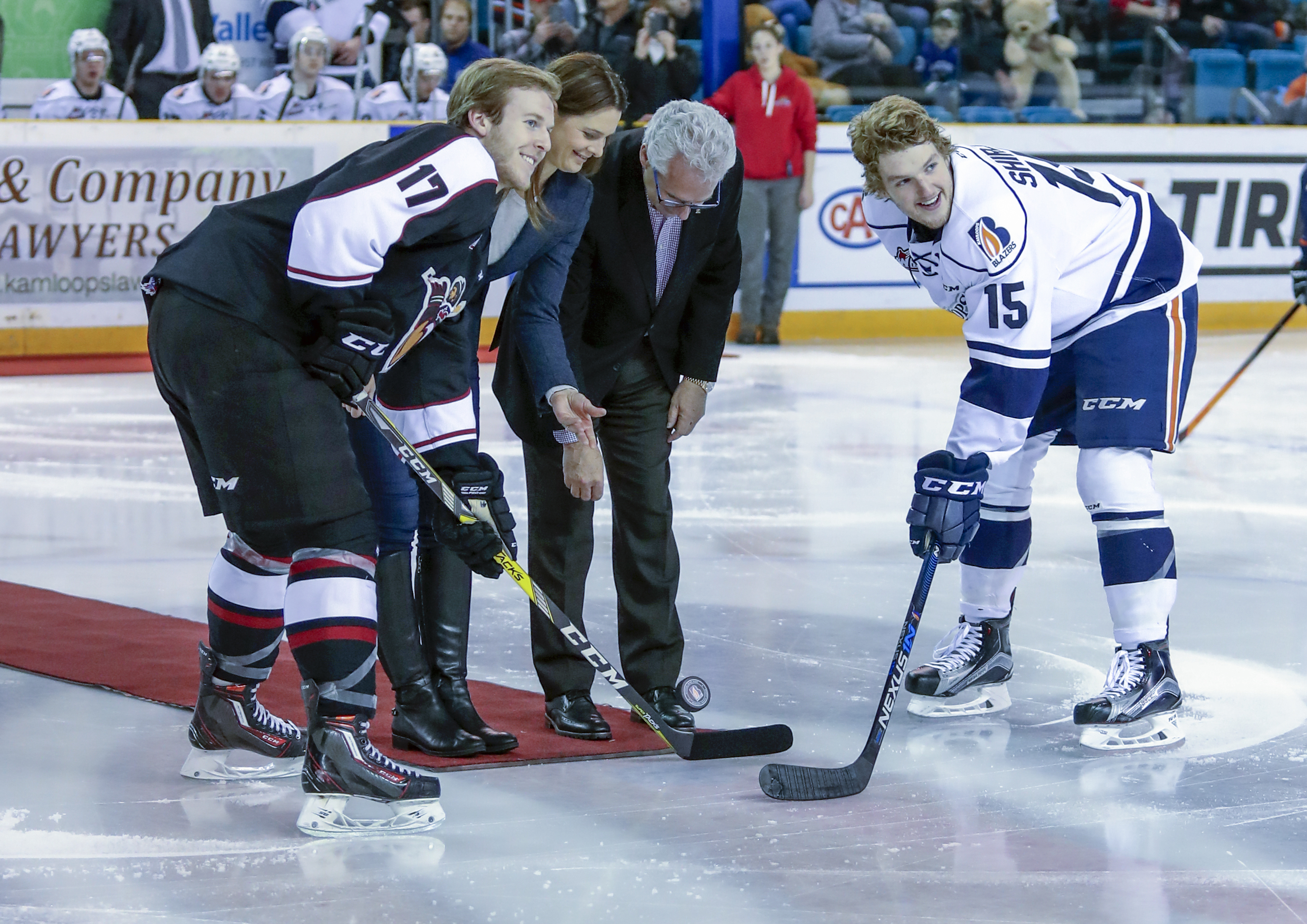 Jennifer Botterill and Tom Renney perform the ceremonial puck drop before the WHL game between the Vancouver Giants and Kamloops Blazers on Saturday December 3, 2016 (photo: Allen Douglas)