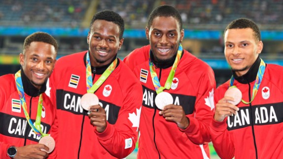 mens 4x100m bronze (L-R) Akeem Haynes Aaron Brown, Brendon Rodney and Andre De Grasse show off their 4x100m bronze medals at Rio 2016 on August 20, 2016. THE CANADIAN PRESS/Frank Gunn