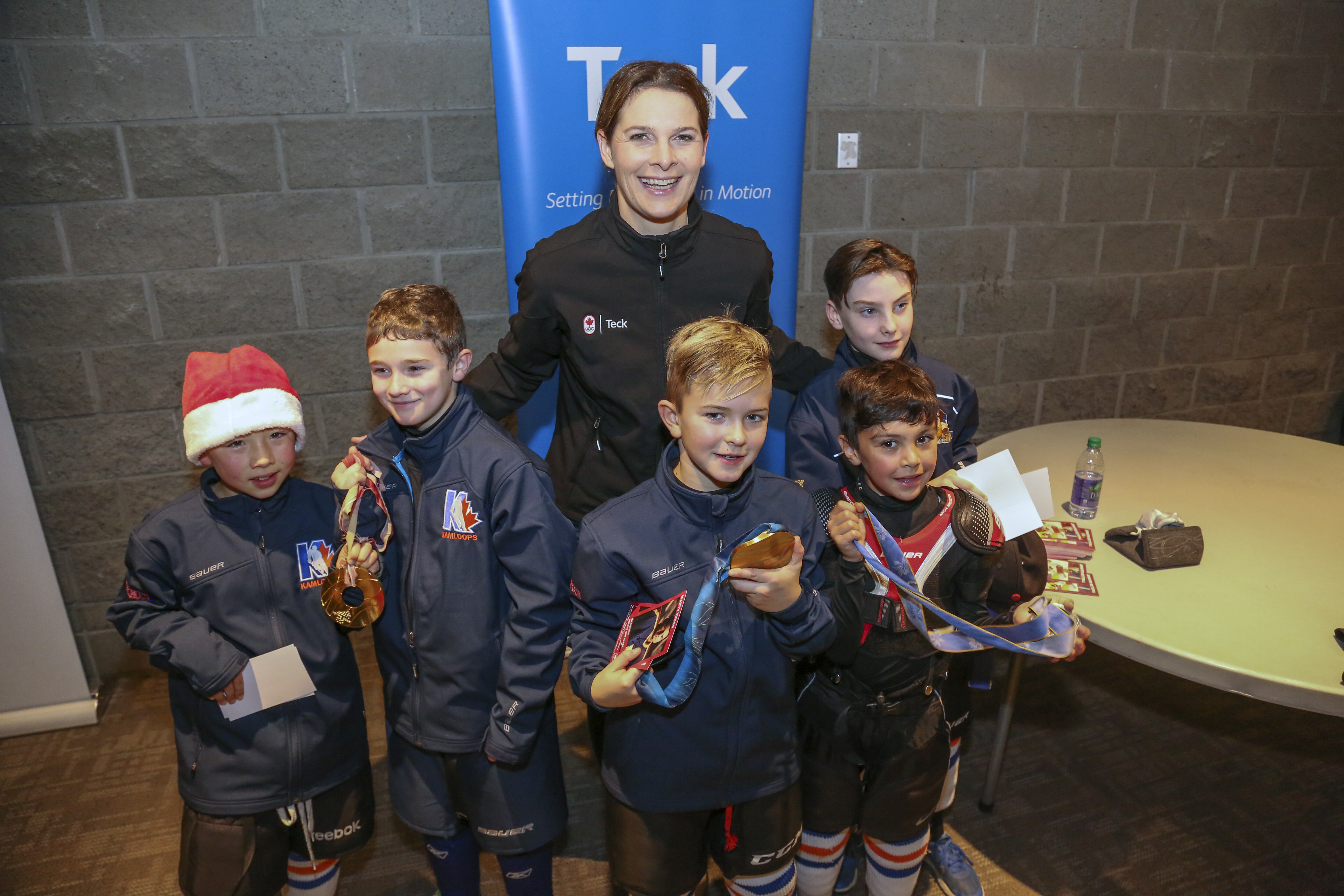 Jennifer Botterill with some of her young fans at the Teck Coaching Series in Kamloops, BC on December 3, 2016 Photo: Allen Douglas