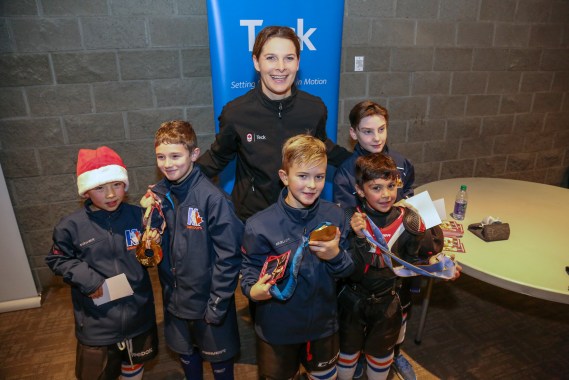 Jennifer Botterill with some of her young fans at the Teck Coaching Series in Kamloops, BC on December 3, 2016 Photo: Allen Douglas