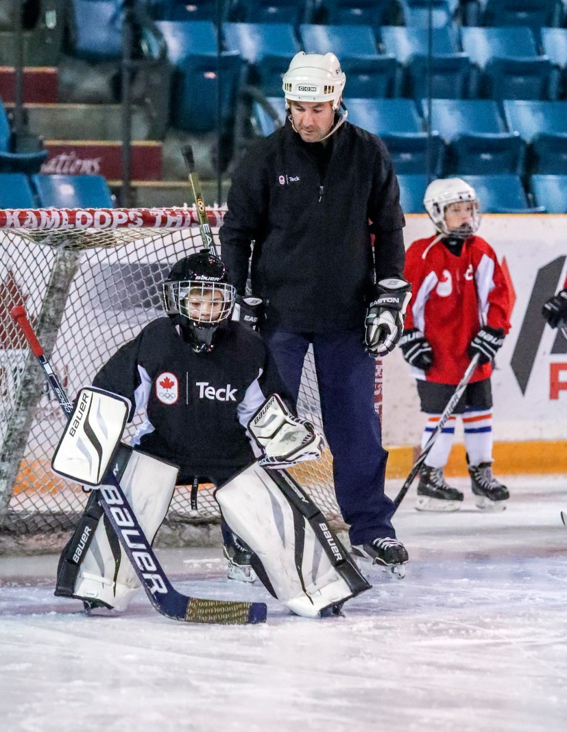 Marty Turco tutors a young goaltender at the Teck Coaching Series in Kamloops, BC on December 3, 2016 Photo: Allen Douglas