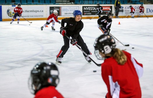Jennifer Botterill interacts with young players at the Teck Coaching Series in Kamloops, BC on December 3, 2016 Photo: Allen Douglas