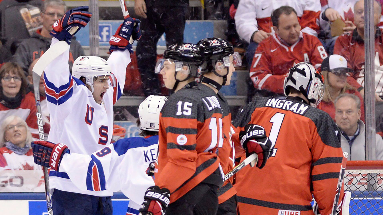 Colin White (left) celebrates his goal against Canada at World Juniors on December 31, 2016. 