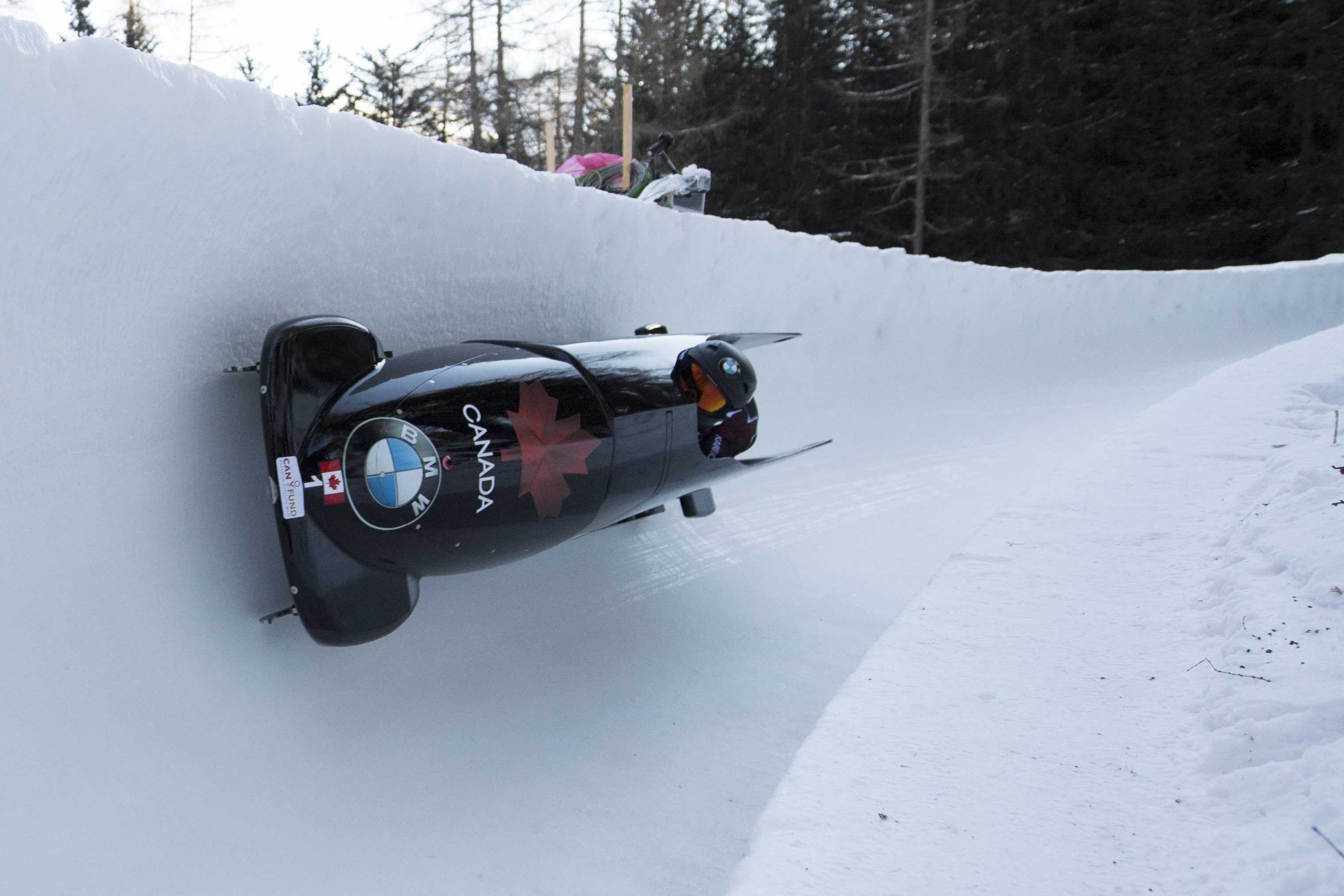 Kaillie Humphries and Melissa Lotholz from Canada speed down the course during the women' two-man bobsled World Cup in St. Moritz, Switzerland, Saturday, Jan. 21, 2017. (Urs Flueeler/Keystone via AP)