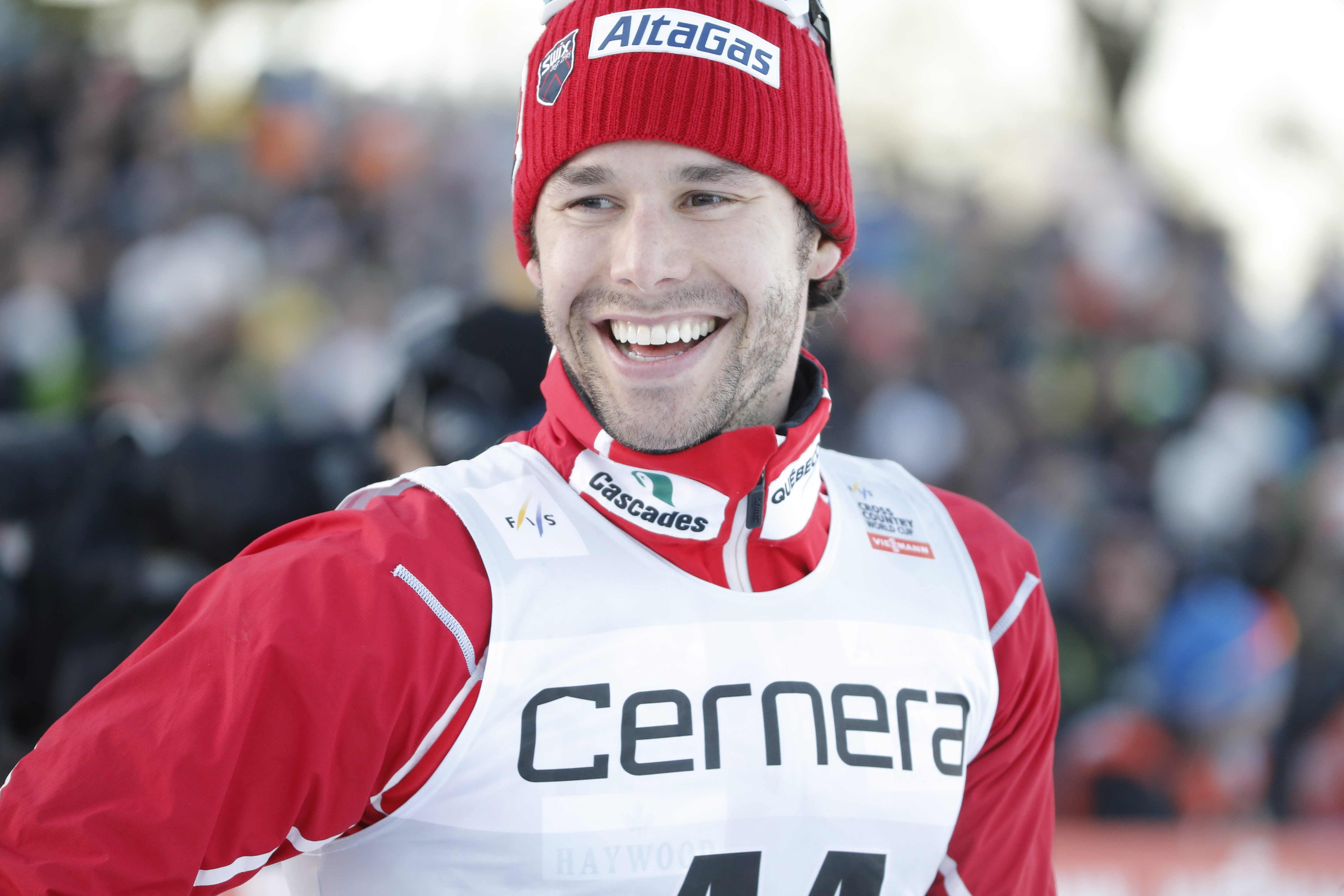 Alex Harvey of Canada reacts after crossing the finish line to win the men's 15km free style competition at the FIS Cross Country skiing World Cup event in Ulricehamn, Sweden, Saturday Jan. 21, 2017. (Adam Ihse / TT via AP)
