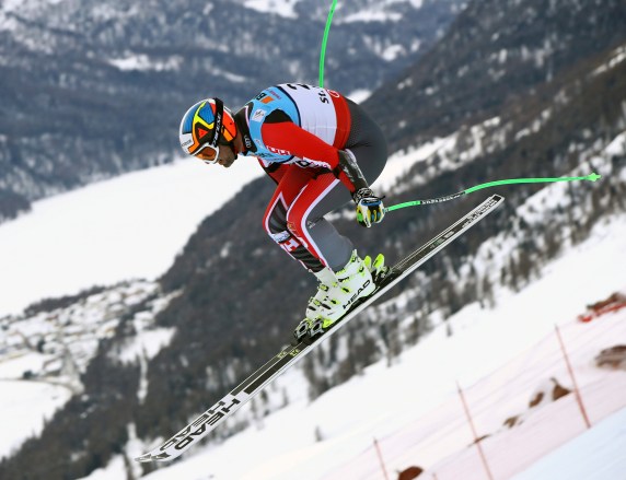 Canada's Manuel Osborne-Paradis is airborne during the men's super-G, at the Alpine Ski World Championships, in St. Moritz, Switzerland, Wednesday, Feb. 8, 2017. (AP Photo/Alessandro Trovati)