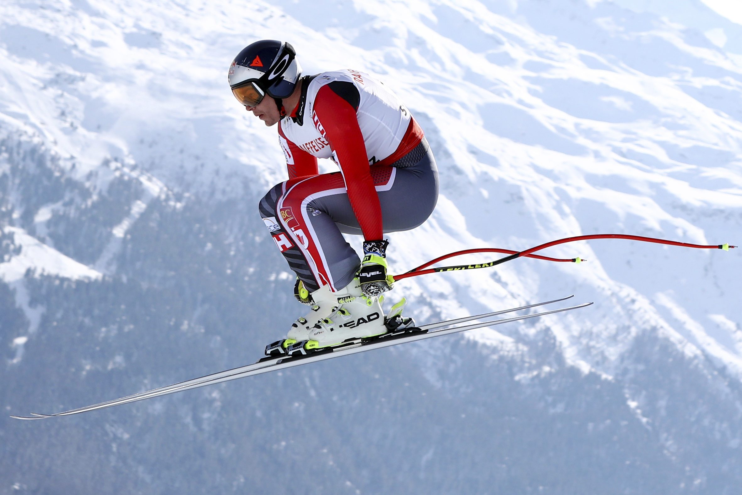 Canada's Erik Guay competes during a men's downhill race, at the alpine ski World Championships in St. Moritz, Switzerland, Sunday, Feb.12, 2017. (AP Photo/Alessandro Trovati)