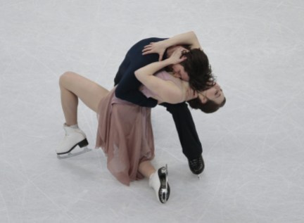 Tessa Virtue, Scott Moir Tessa Virtue and Scott Moir, of Canada, skate their free dance to win the gold at the world figure skating championships in Helsinki, Finland, on Saturday, April 1, 2017. (AP Photo/Ivan Sekretarev)