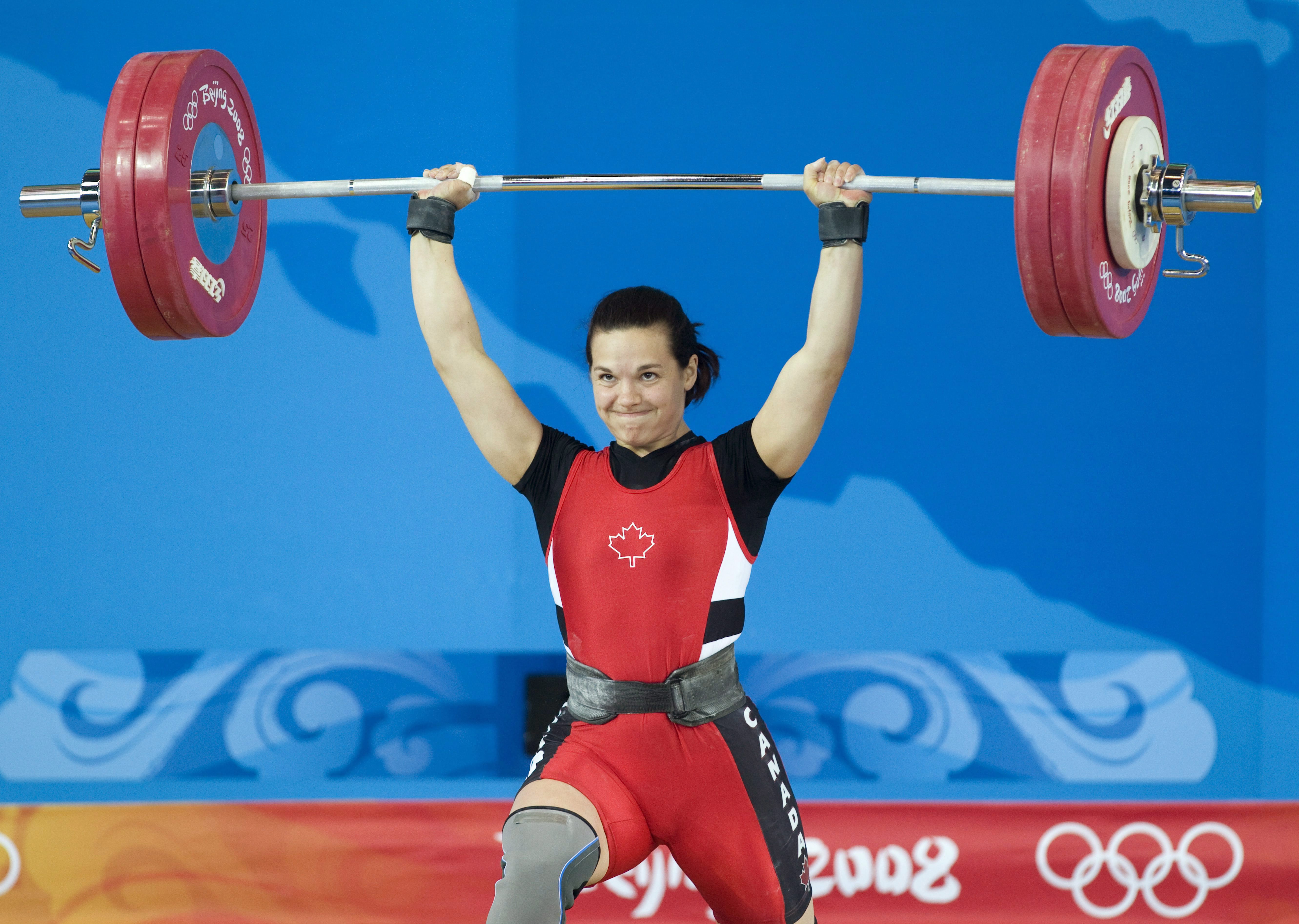 ...from Rouyn-Noranda, Quebec, makes her final attempt at 130kg in the wome...