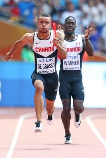 Justyn Warner and Andre De Grasse in the 4x100m relay at the 2015 IAAF World Championships Photo: Claus Andersen