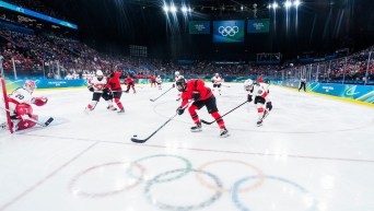 Laura Stacey competes in ice hockey.