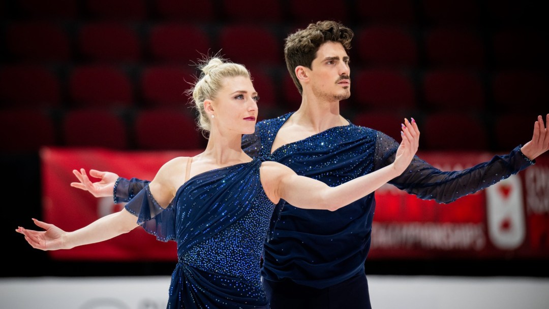 Piper Gilles and Paul Poirier pose in their free skate