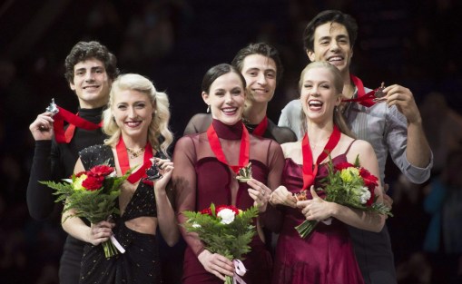 Ice dance gold medallists Tessa Virtue and Scott Moir, centre, silver medallists, Piper Gilles and Paul Poirier, left, and bronze medallists Kaitlyn Weaver and Andrew Poje, right, hold their medals following the 2018 Canadian National Skating Championships in Vancouver, B.C., Saturday, Jan. 13, 2018. THE CANADIAN PRESS/Jonathan Hayward